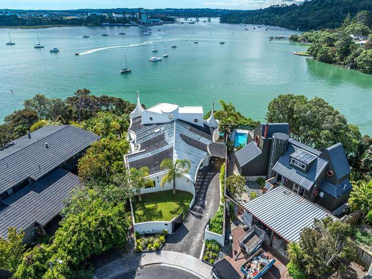The distinctive waterfront house was designed by renowned Kiwi architect Ian Burrow and sold for just under $2m. Photo / Supplied