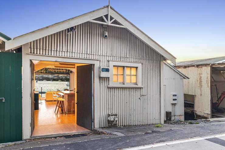 The picturesque boatshed at Auckland's Hobson Bay is often used as a shooting location for David Lomas Investigates. Photo / Supplied