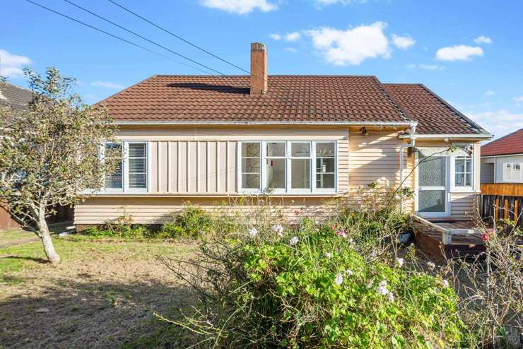 The listing for this three-bedroom do-up home on Wyllie Road, in Papatoetoe, Auckland, made clear the owner was going to auction to sell. Photo / Supplied