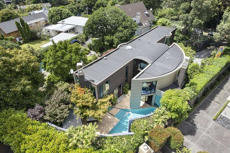 The Ron Sang house on Glenfell Place, in Epsom, Auckland, was sold under the hammer at an art and property auction today. Among the 200 artworks on the block was a bronze and yellow sculpture by Paul Dibble.  Photo / Supplied