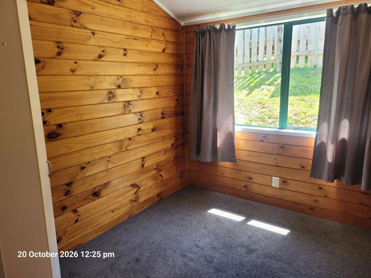 Tidy three bedroom house with a good single garage. 1