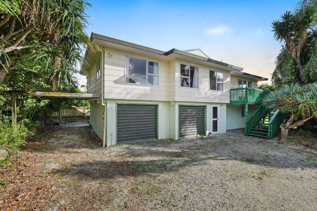 TLC needed 5-Bedroom Home with Great Potential!