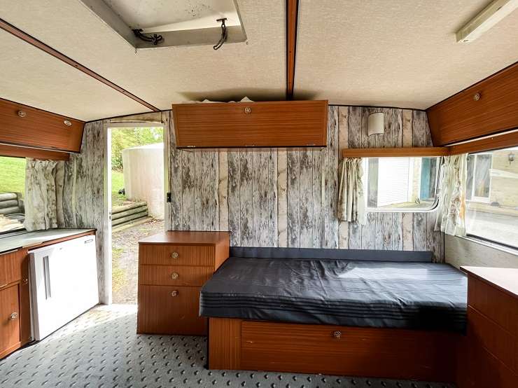 The reality TV winners Alice and Caleb Pearson have just completed their first caravan renovation. Photo / Supplied