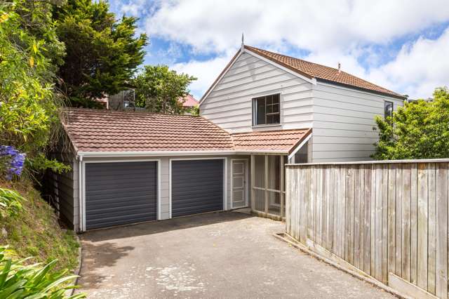 THREE BEDROOMS AND LARGE GARAGING