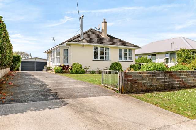 4 Car Garaging and A Warm Home