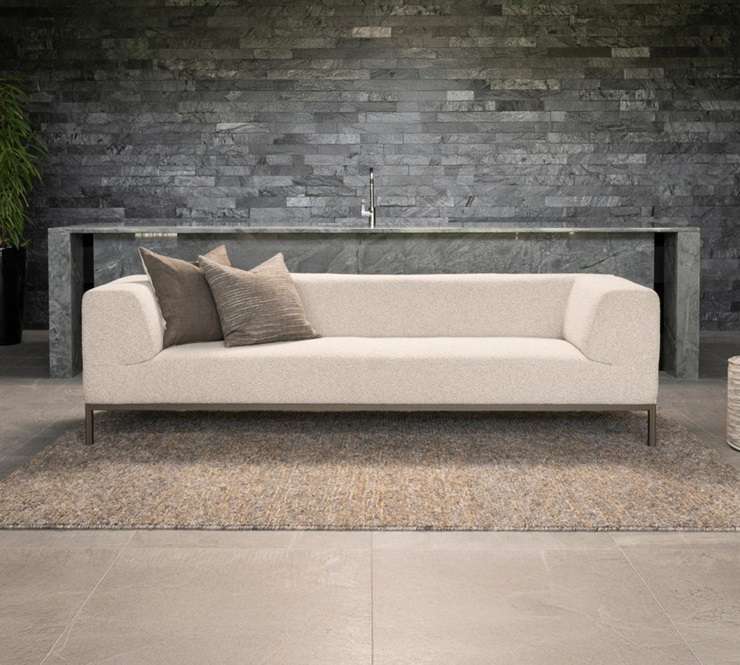 Choosing the right sofa involves focusing on structure, weight, materials, and guarantees. Artwork / Beth Walsh