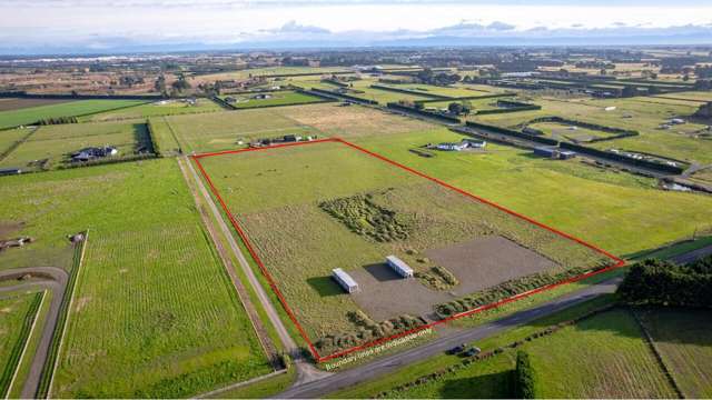 Four Hectares Bare land in Prime location