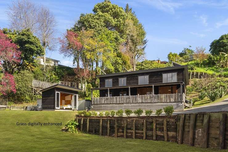 The three-bedroom, one-bathroom off-grid home on Ridge Street, in Otumoetai is thought to be the only one like it in central Tauranga. Photo / Supplied