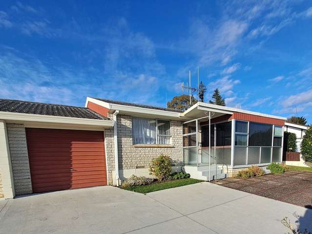 Sunny and Elevated 2-Bedroom Unit Plus Garage