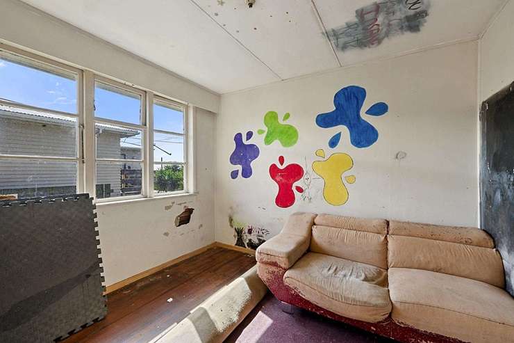 A three-bedroom do-up on Mould Street, in Waitara, could sell for as low as <img when it goes to auction next week. Photo / Supplied