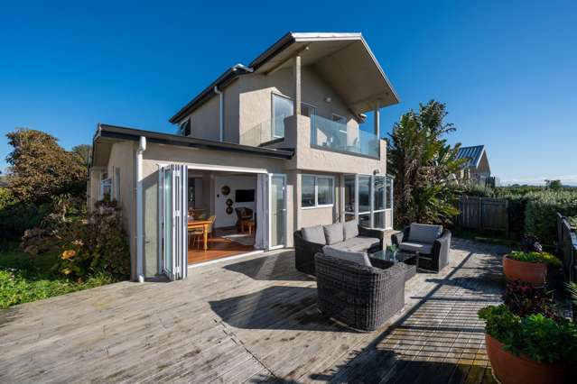 Effortless Beachfront Living with Space to Spare