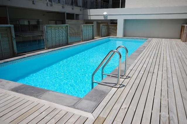 Sunny unfurnished apartment with outdoor pool