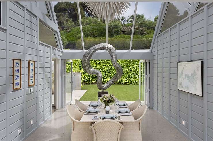 white pavilion house with glass roof and infinity pool  729 Orapiu Road, Omaru Bay, Waiheke Island Auckland