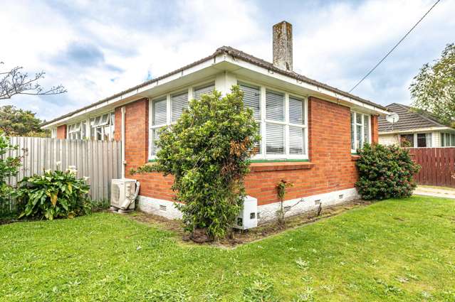 Classic 3-Bedroom, Brick Home with Potential