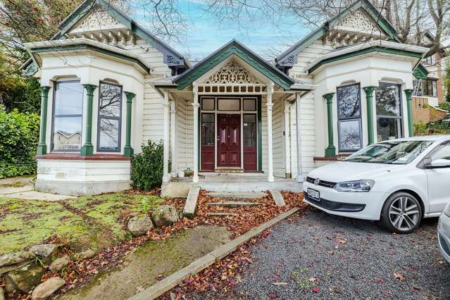 Renovated Central City Investment With Development Potential