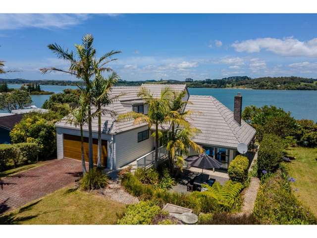 STUNNING WATERFRONT HOME WITH MOORING!