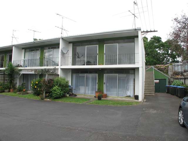 Sunny upstairs unit with balcony