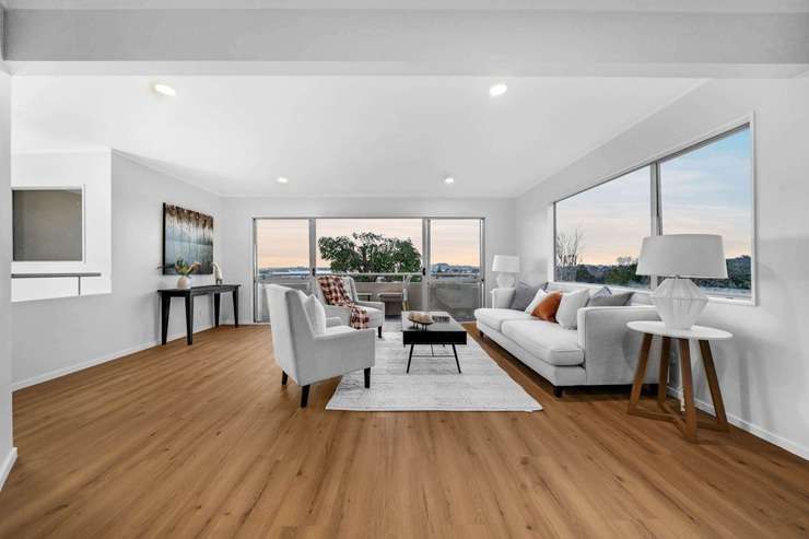 A four-bedroom townhouse on Raleigh Road, in Auckland’s Northcote, is back on the market after the vendor bought it at a court-ordered auction earlier this year. Photo / Supplied