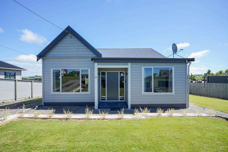 A two-bedroom home for sale at 11 High Street East, in Nightcaps, Southland, is seeking offers over <img59,000. Photo / Supplied