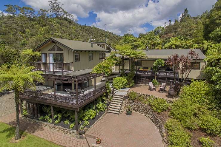 deck chairs overlooking roof tops to the sea at 306B Beverly Terrace, Whangamata, Coromandel Peninsula, Waikato