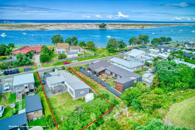 Steps from the water's edge and boat ramp