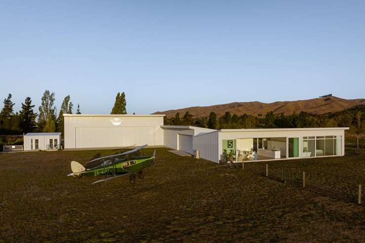 The unique home built by aviation enthusiasts backs onto the Omaka Airfield, in Blenheim. Photo / Supplied