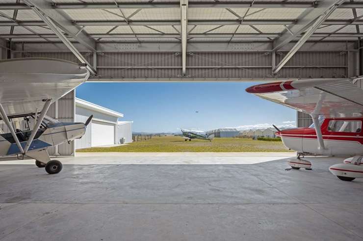 The unique home built by aviation enthusiasts backs onto the Omaka Airfield, in Blenheim. Photo / Supplied