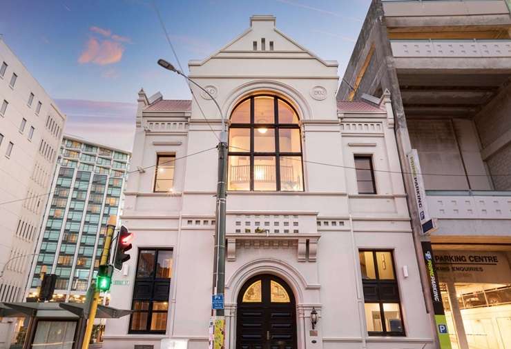 The Beehive dominates the view from the lounge of 1A/7 Stout Street, in Wellington Central. Photo / Supplied