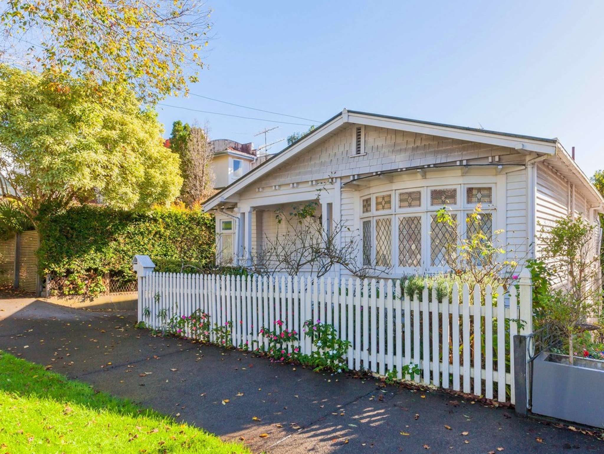 Modest bungalow among the multi-million-dollar mansions