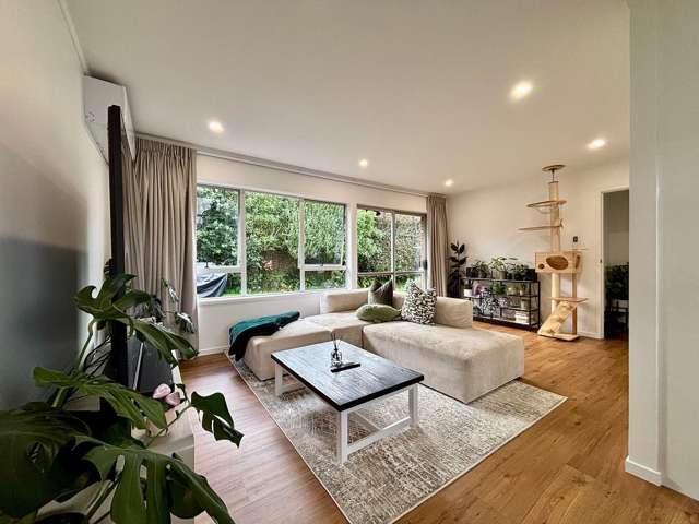 Sunny renovated unit with private backyard
