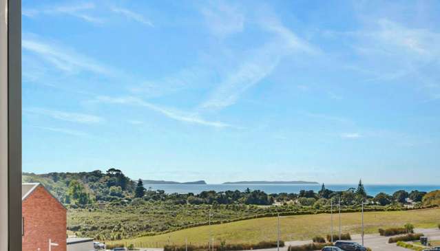 303/84C Te Oneroa Way Long Bay_1