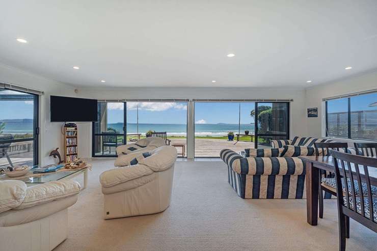 A beachfront stunner on Kenwood Drive, in Matarangi, was snapped up by a family with ties to the town. Photo / Supplied