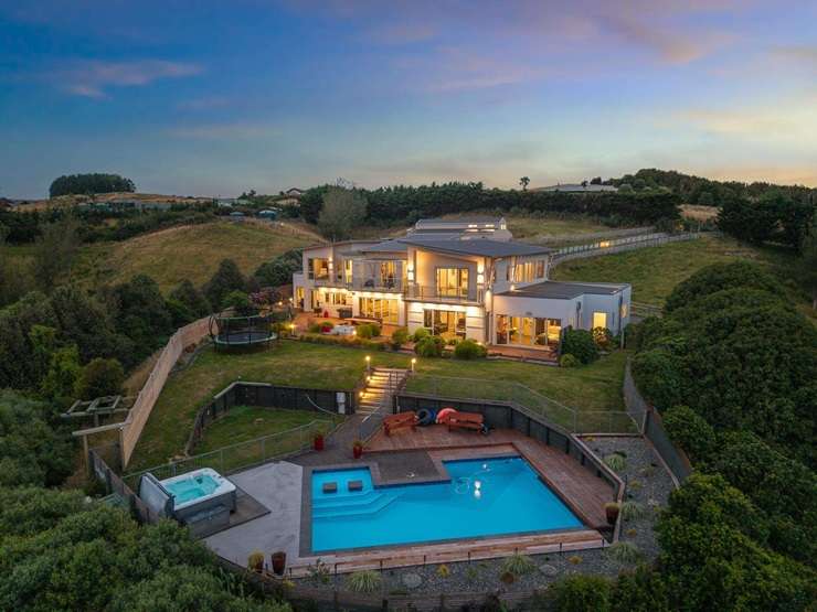 A four-bedroom luxury home is up for grabs for just over $2m at 22 Milford Street, in Aotea. Photo / Supplied