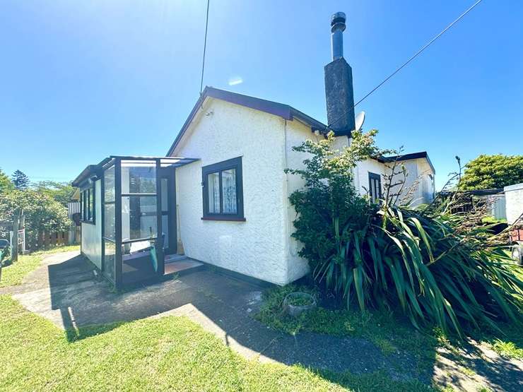 A comfy two-bedroom home at 41 Rangatira Drive, in Mangakino, Taupō, is looking for offers over $290,000. Photo / Supplied