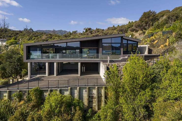 A luxury two-bedroom, two-bathroom home on Harbour View Road, in Coromandel, has an asking price of $3.35m. Photo / Supplied