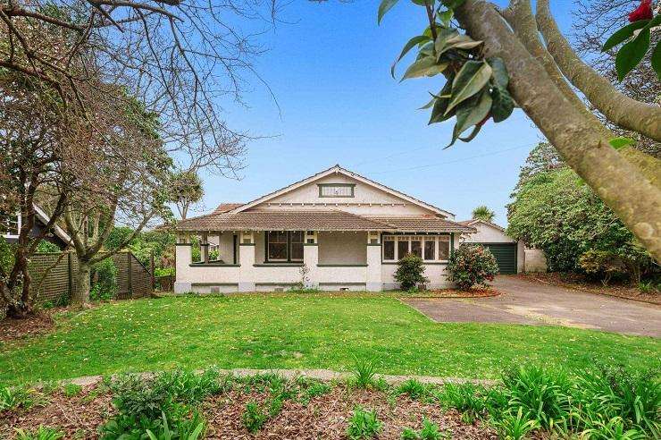 Real estate duo Callum and Anna Piesse decided to get in theme to sell a character 1920s home on Sophia Street, in Glenholme. Photo / Supplied