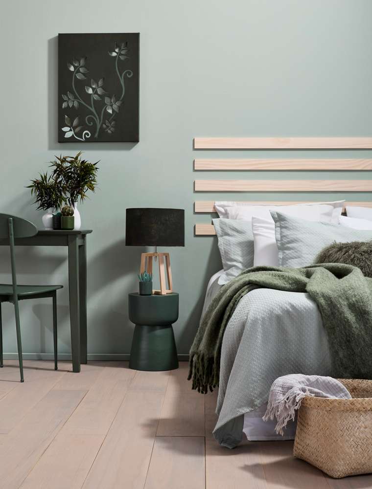 A contrast pattern and depth of colour bring rich warmth to this room that still feels inspired by the coast. Project by Annick Larkin. Mural Hannah Tapner.  Photo / Bryce Carleton