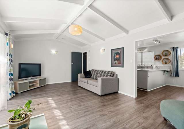 Charming 3BR Home with covered deck & garage!