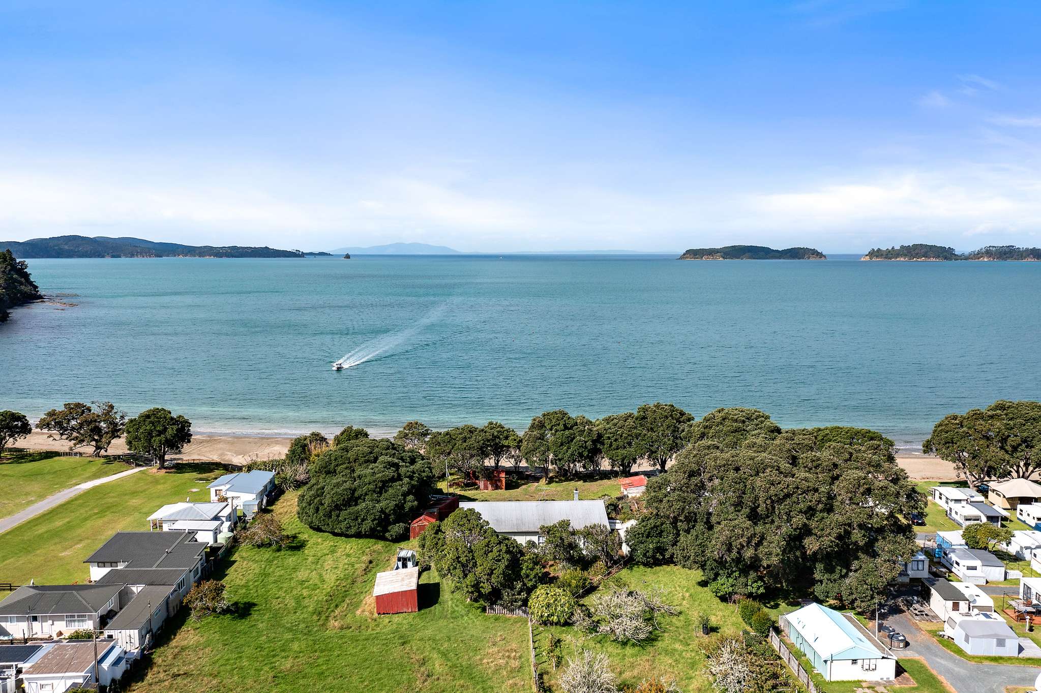 Large slice of beachfront home and land in Martins Bay on the market