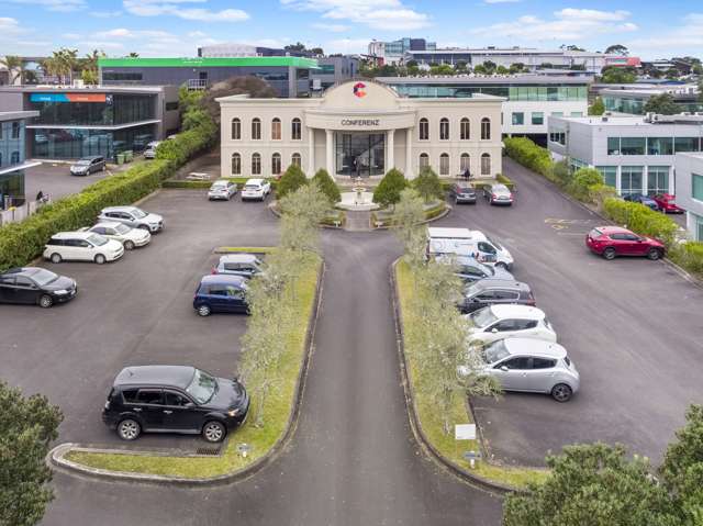 Mock Georgian-style office block with fountain for sale