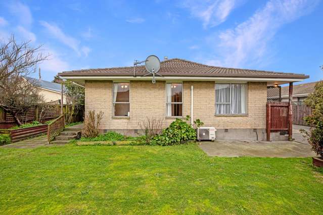 Invest or Nest 2-Bedroom Unit with Potential