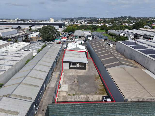 Functional workshop with expansive yard