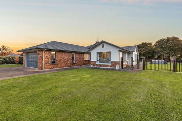 Tranquil half-acre haven near town!