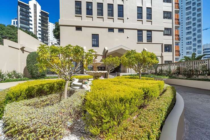 concrete block basement with shelves  storage locker S6-02/65 Fort Street, Auckland central