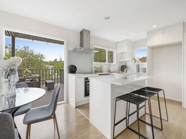 Elevated North Shore Living with Coastal Charm!