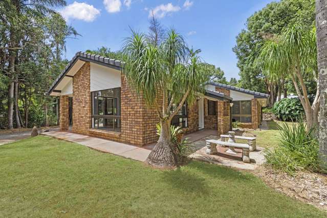 A Rare Acreage Retreat - Quiet, Private & Close to Everything