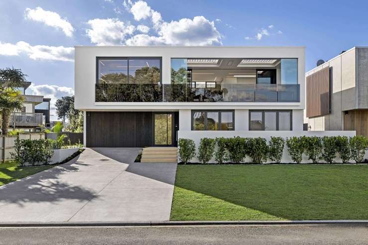 A concrete and glass beach home at Beverley Terrace, in Whangamatā, sold in December. It had a RV of $6.45m. Photo / Supplied