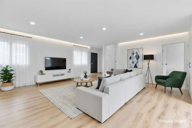 SPACIOUS, LOW-MAINTENANCE 2-LEVEL LIVING WITH 2 CARPARKS