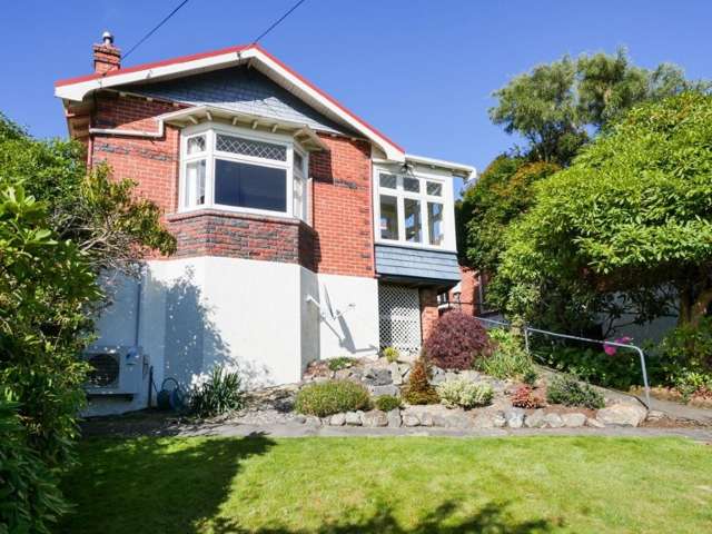 A sunny brick house in Roslyn with fantastic views