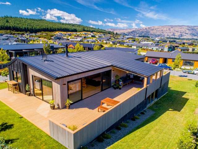 Modern living with lake and mountain views